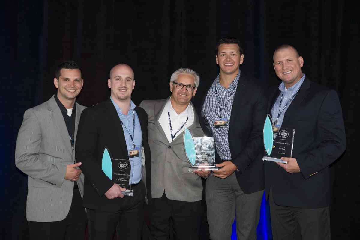 Caption: Jersey Mike's Subs awarded its prestigious Franchisee of the Year Award to Bob Middleton, Bill Biga, and Carl Chandler of Sharing the Bread, Inc. which operates 11 Jersey Mike’s restaurants in Michigan. Accepting the award last week at Jersey Mike’s National Conference in Orlando, Fla. are (l-r): Franchisees Matt Makin, Adam Chandler, Bob Middleton, Ryan Garrett; and Bill Biga.