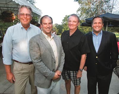 From left: Frank Czaszynski, Jersey Mike's president of corporate development; Don Pignataro, executive director of Holiday Express; Tim McLoone, founder of Holiday Express; and Peter Cancro, Jersey Mike's owner and founder.
