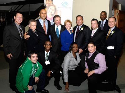 Members of Boys & Girls Clubs in New Jersey along with Connie Ludwin (center, getdate(), getdate() ), State Director, and Joe Piscopo (top row, left, getdate(), getdate() ), spokesperson, congratulate Peter Cancro (fourth from right, getdate(), getdate() ), Founder and CEO, Jersey Mike's Subs as he was honored as Humanitarian of the Year by the organization.