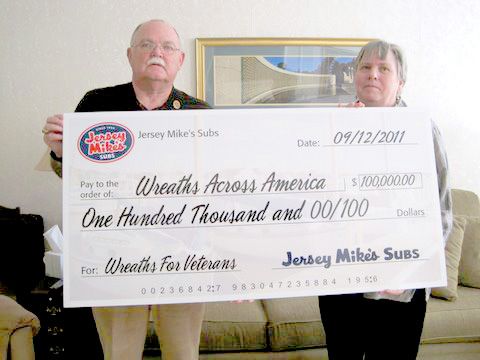 Mr. Wayne Hanson of the Maine State Society and Chairman of Wreaths Across America with Ruth Stonesipher, past National President of the American Gold Star Mothers and member of the Wreaths Across America Advisory Board, after receiving the $100,000 check from Jersey Mikes.