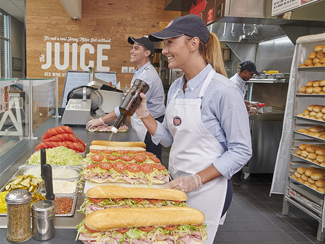 Jersey Mike's Employees Working behind the counter
